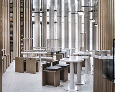 mirror ceilings and glass curtains decorate bookstore interior by x+living in china