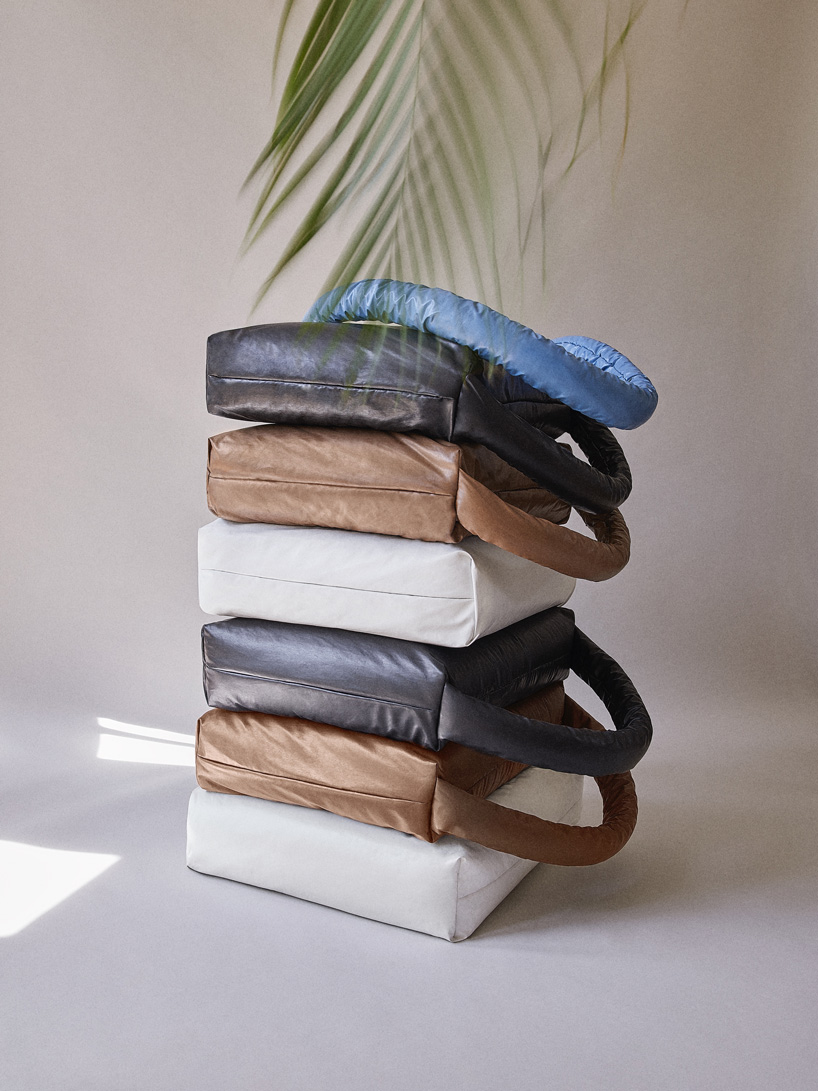 muller van severen's modular 'pillow sofa' for KASSL editions is wrapped in oil-coated fabric