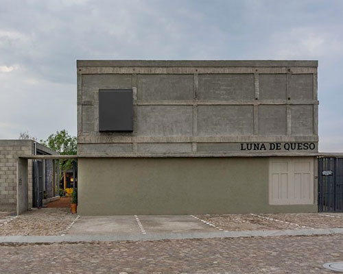 multi-textured brutalist facade clads delicatessen restaurant by mauricio alonso in mexico