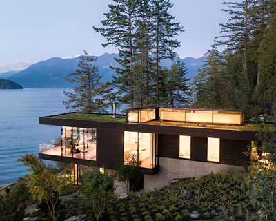 omb designs a contemporary cabin in the woods on the shore of bowen island in canada