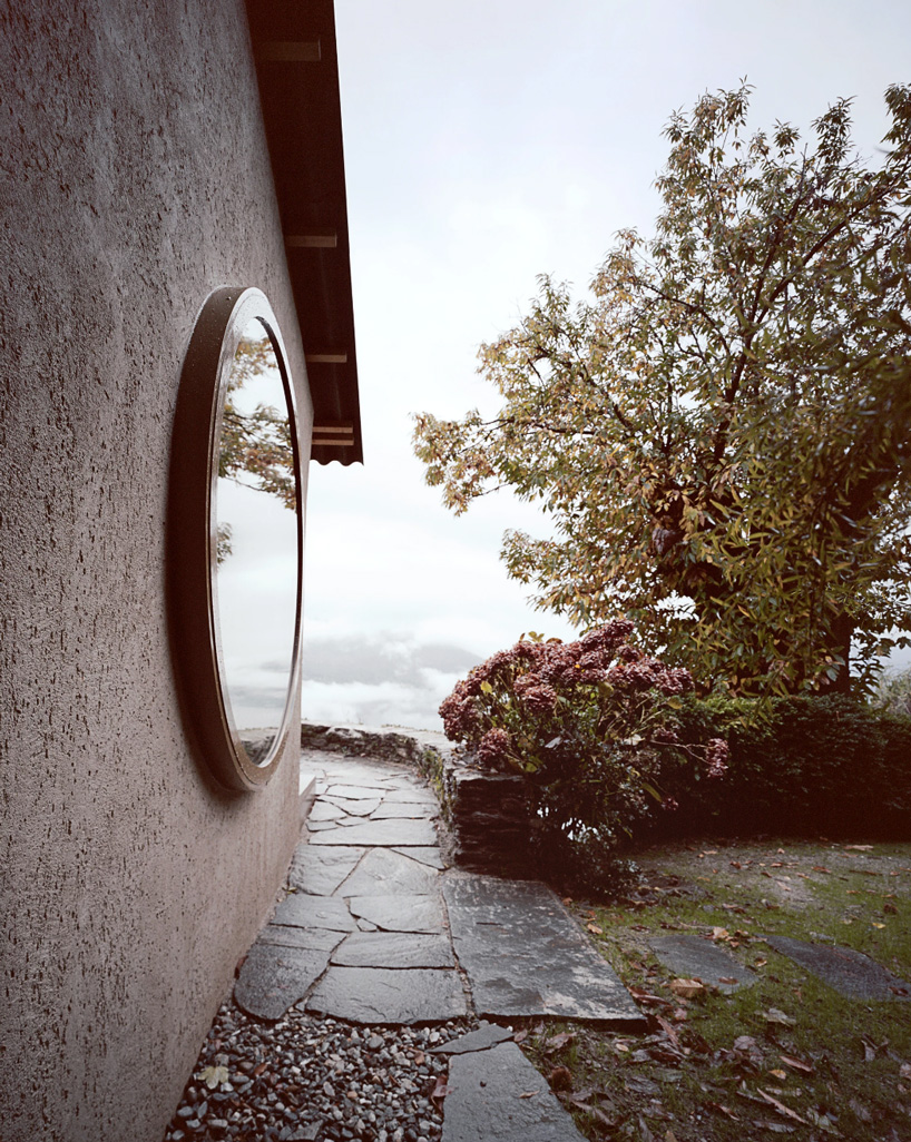 studio inebi renovates 1950's 'calascino' summer house in switzerland - 3