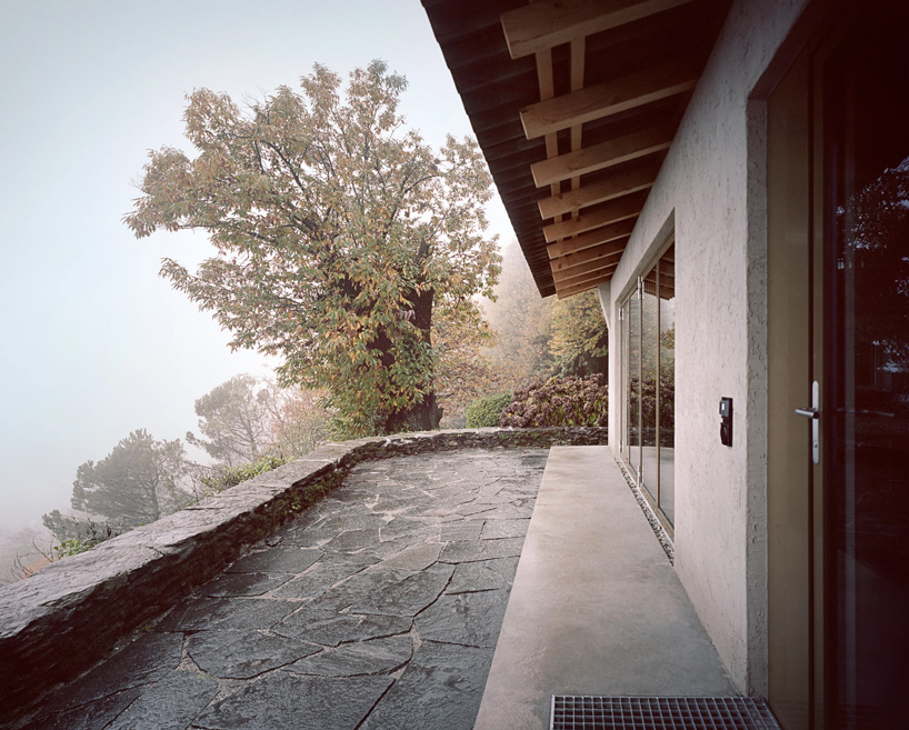 studio inebi renovates 1950's 'calascino' summer house in switzerland - 4