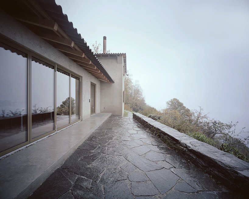 studio inebi renovates 1950's 'calascino' summer house in switzerland - 5