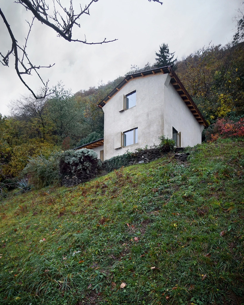studio inebi renovates 1950's 'calascino' summer house in switzerland - 1
