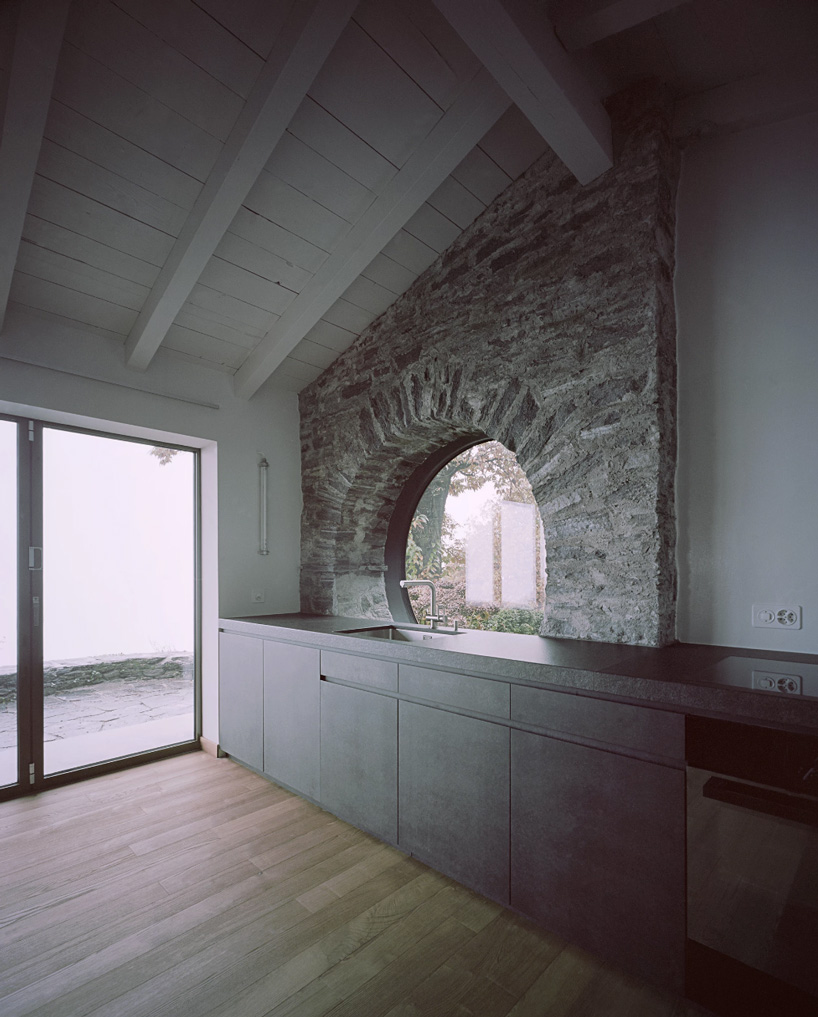 studio inebi renovates 1950's 'calascino' summer house in switzerland - 6