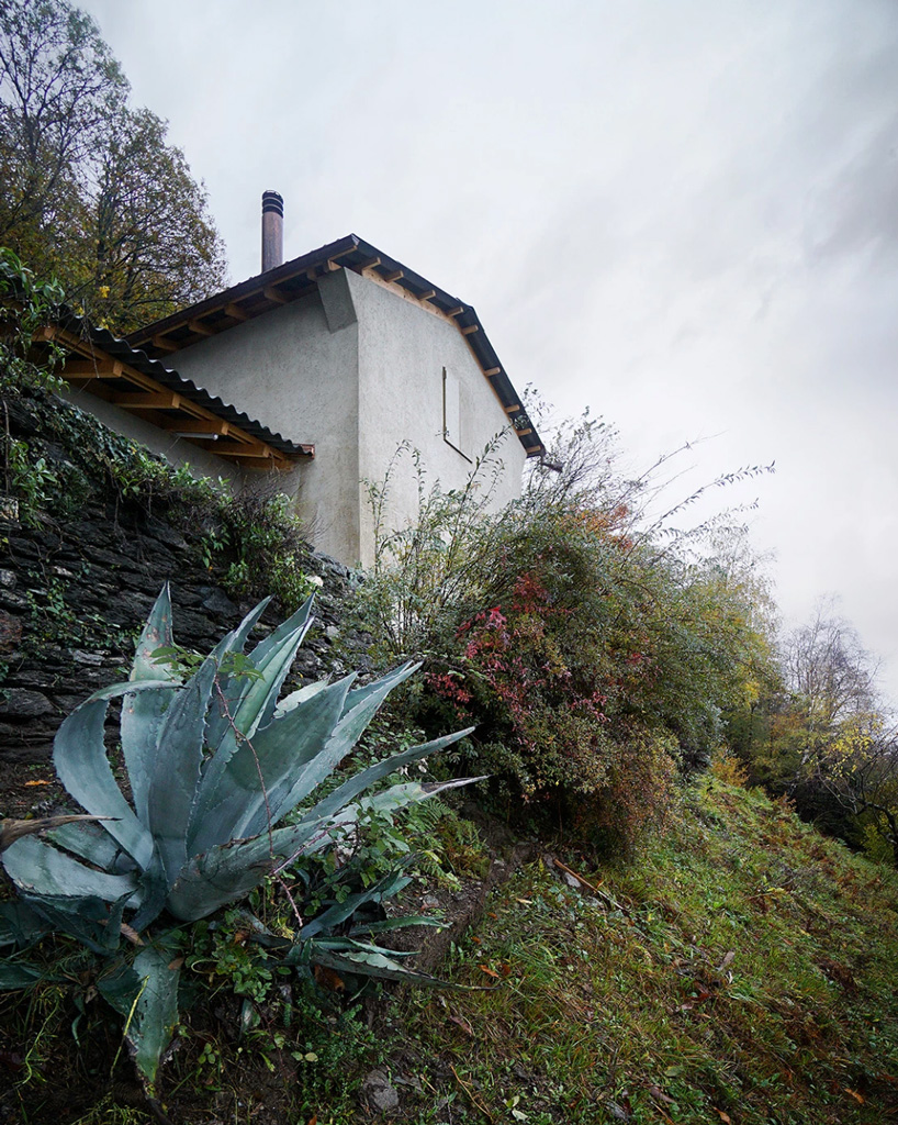 studio inebi renovates 1950's 'calascino' summer house in switzerland - 12