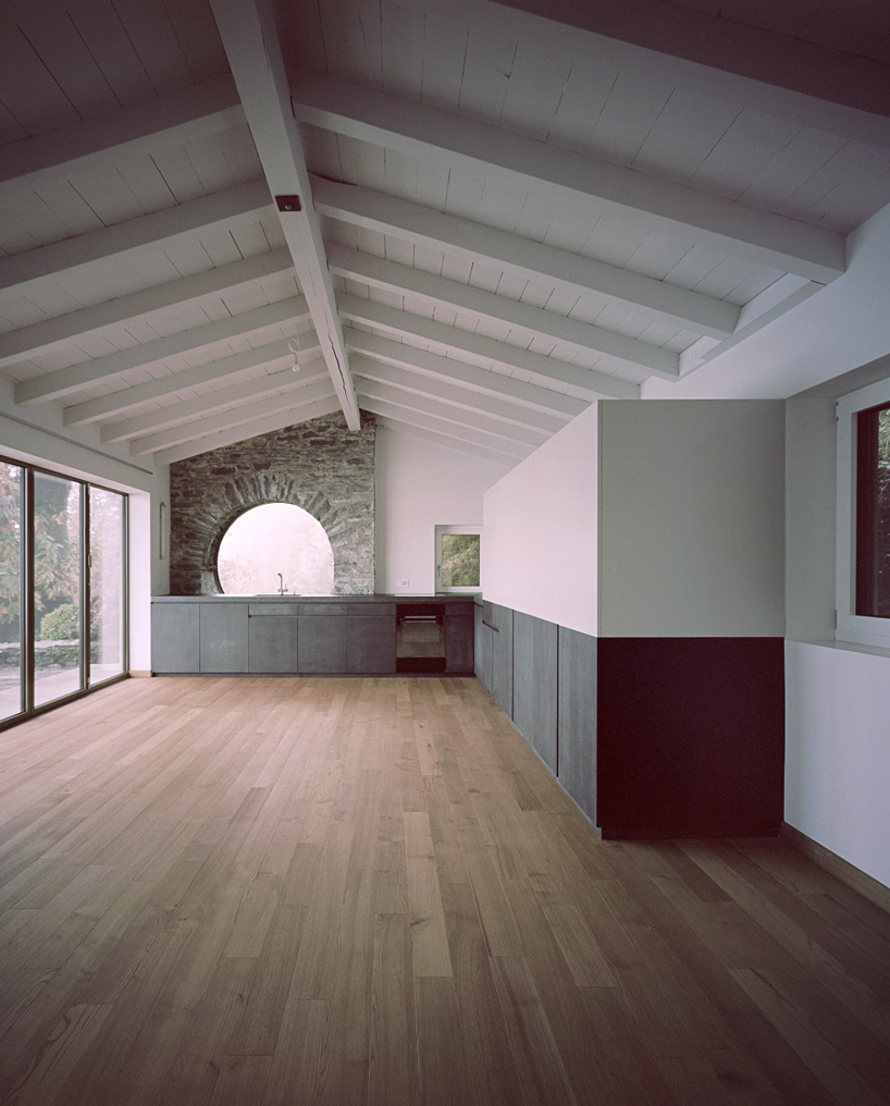 studio inebi renovates 1950's 'calascino' summer house in switzerland - 7