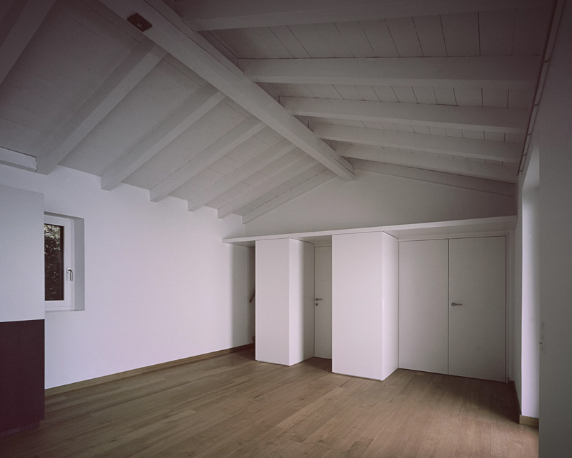 studio inebi renovates 1950's 'calascino' summer house in switzerland - 8