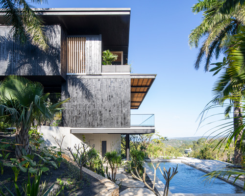 studio saxe clads 'tres amores' house in costa rica with charred timber façades
