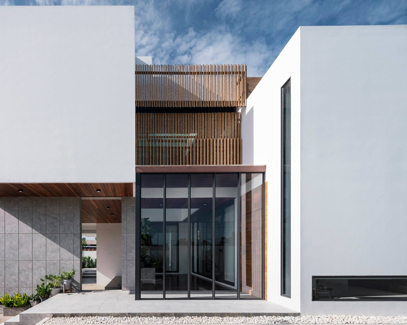 glass voids allow natural light to enter the house