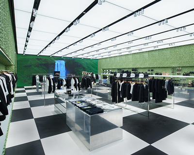 prada's boutique store in tokyo has backlit 'sponge' walls designed by OMA