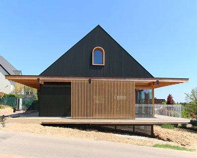 AL PEPE architects uses local timber and an archetypal form for HD house in france