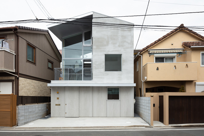 front view of atelierco architects' 'brass house' in tokyo
