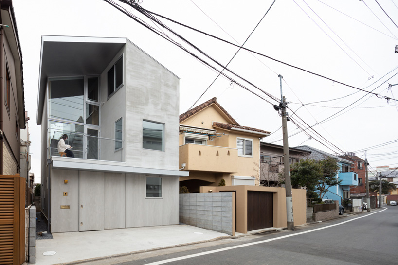 exterior view of atelierco architects' 'brass house' in tokyo