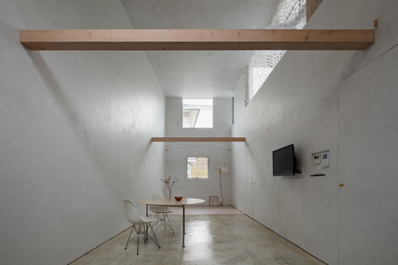 main living space in atelierco architects' 'brass house' in tokyo