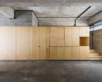 BAAQ' inserts wooden modular system to 1960s apartment building in mexico city