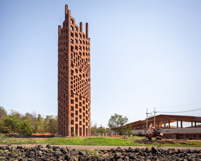 bangkok project studio builds brick observation tower at 'elephant world' in thailand