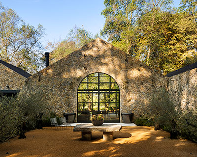 chain + siman & modo manera create stone retreat influenced by mexican haciendas