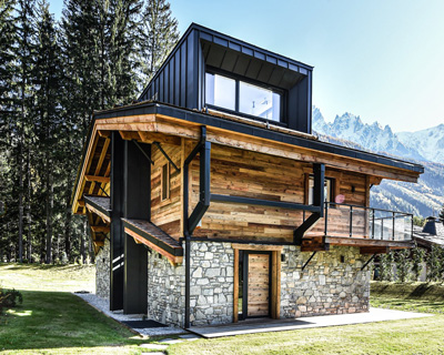 chevallier architectes tops alpine chalets with contemporary dormers in chamonix, france