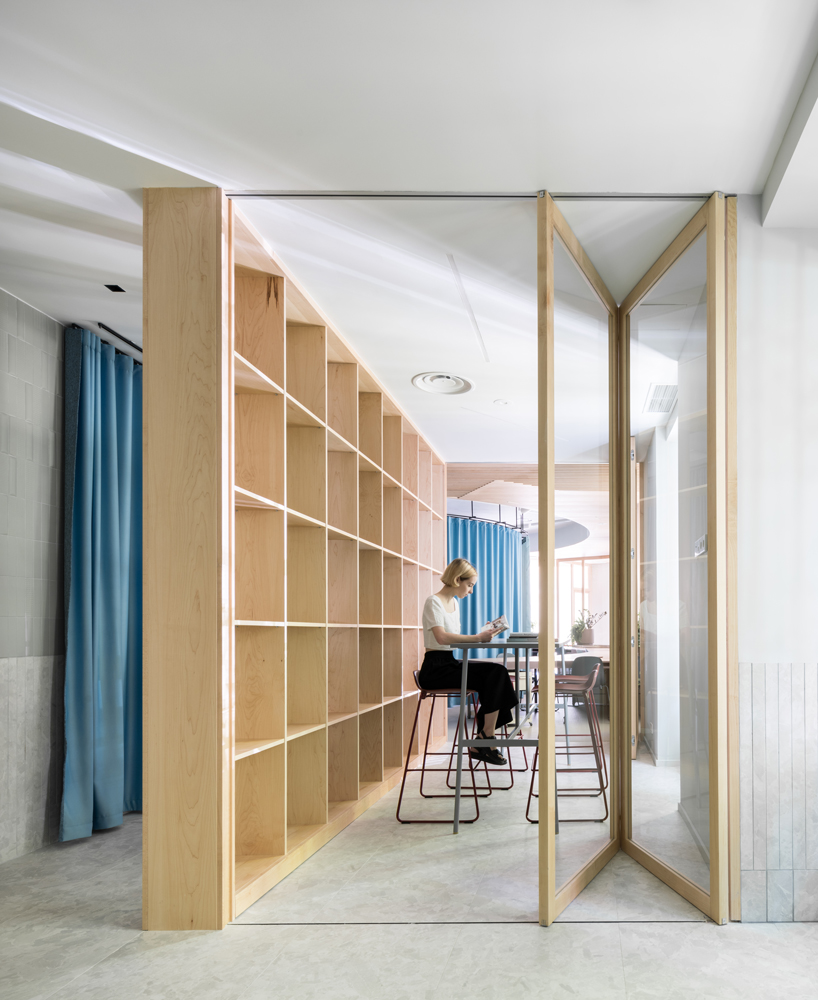ENORME studio uses movable partitions to create flexible office in madrid designboom