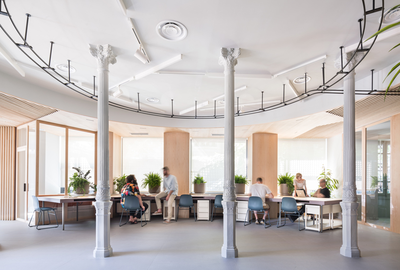 ENORME studio uses movable partitions to create flexible office in madrid designboom