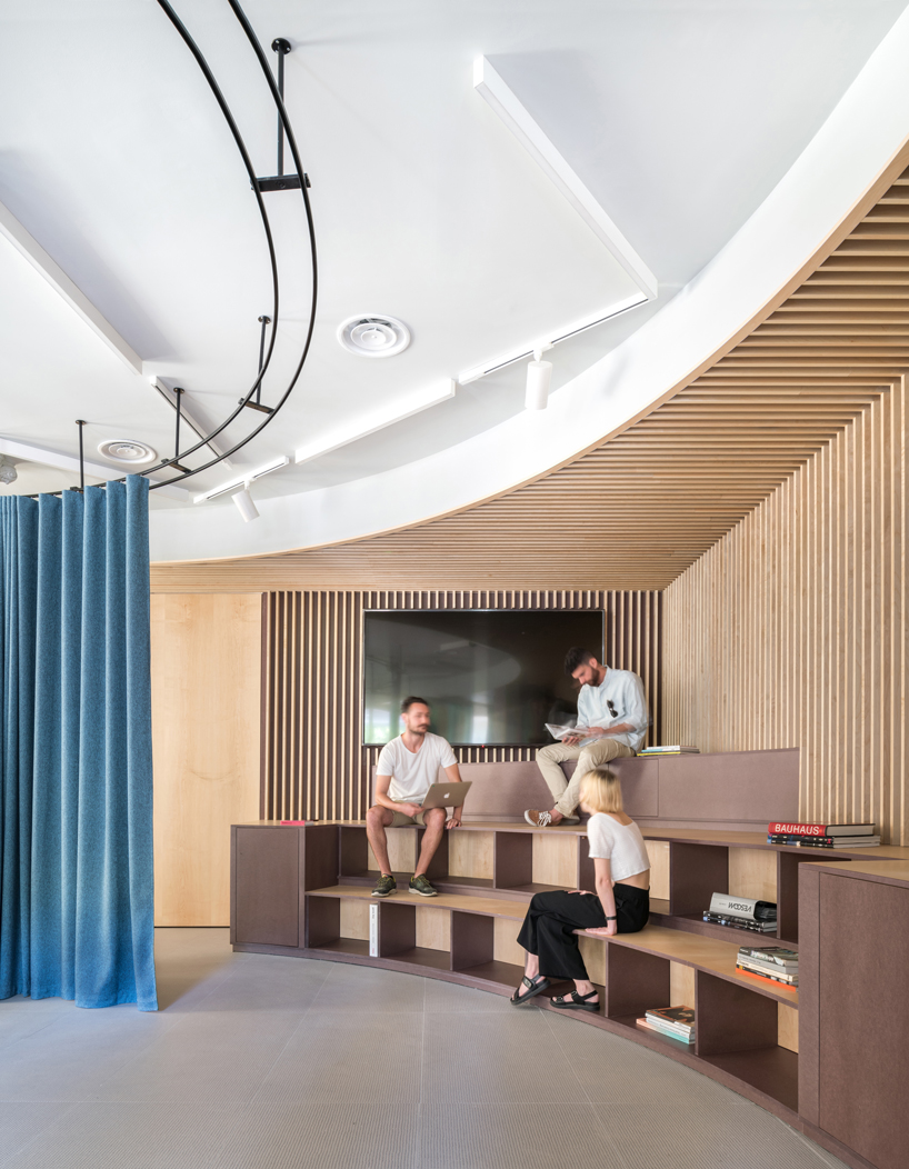 ENORME studio uses movable partitions to create flexible office in madrid designboom