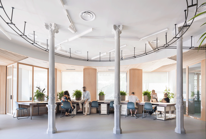 ENORME studio uses movable partitions to create flexible office in madrid designboom