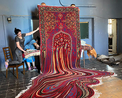 faig ahmed's 'doubts' carpet seemingly drips into a whirling pool of patterns