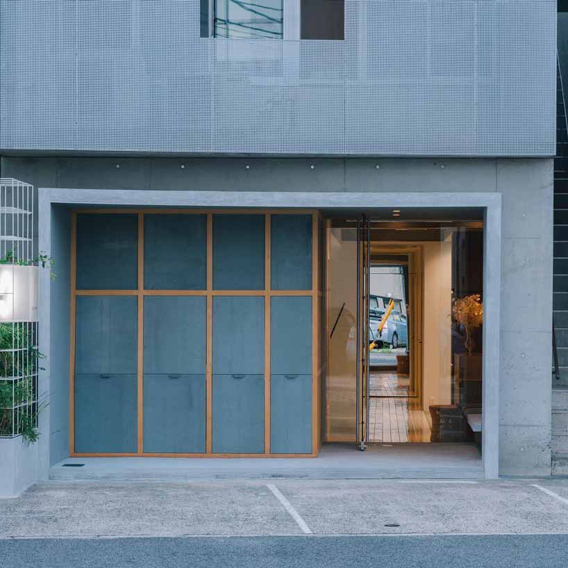 fathom clads japanese hair salon in façade of galvanized iron folding screens