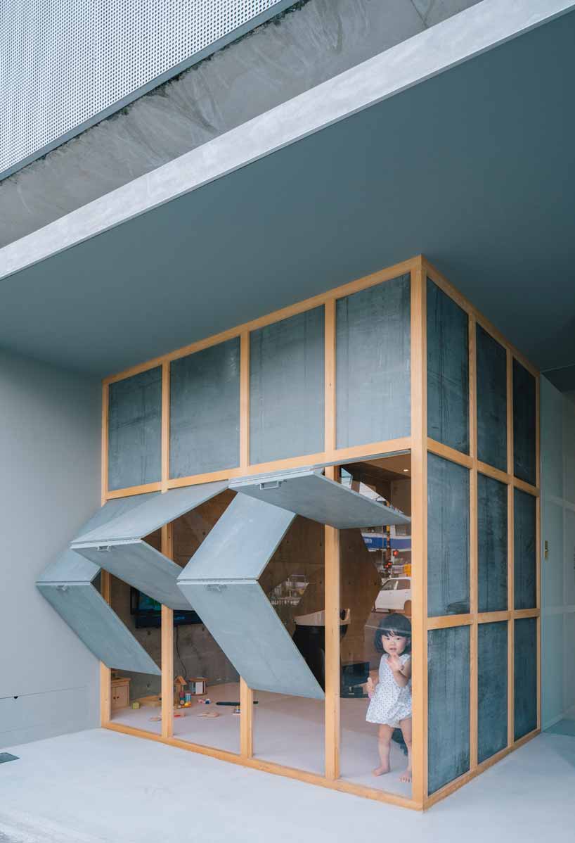 fathom clads japanese hair salon in façade of galvanized iron folding screens