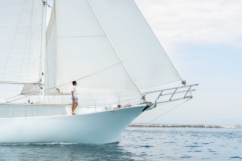 fran silvestre arquitectos redesigns turkish schooner to create all-white sailing vessel - 4
