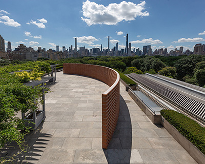 hector zamora installs lattice detour at the met — a curved, see-through brick wall