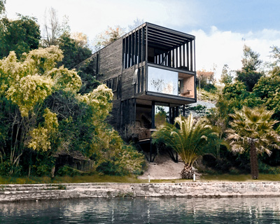 hsu-rudolphy arquitectos embeds 'slope house' into the banks of chile's rapel lake