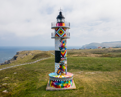 faro lighthouse in spain undergoes a vibrant transformation by okuda san miguel