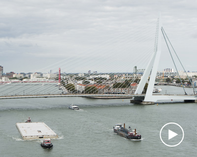 designed by powerhouse company, the world's largest floating office arrives in rotterdam