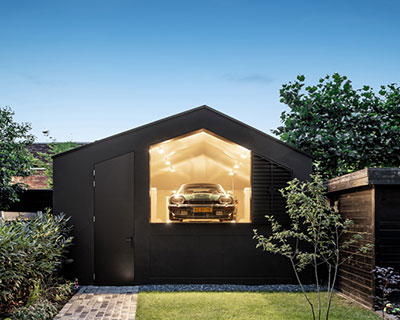 private car showroom by bureau fraai in amsterdam frames views of iconic jaguar models