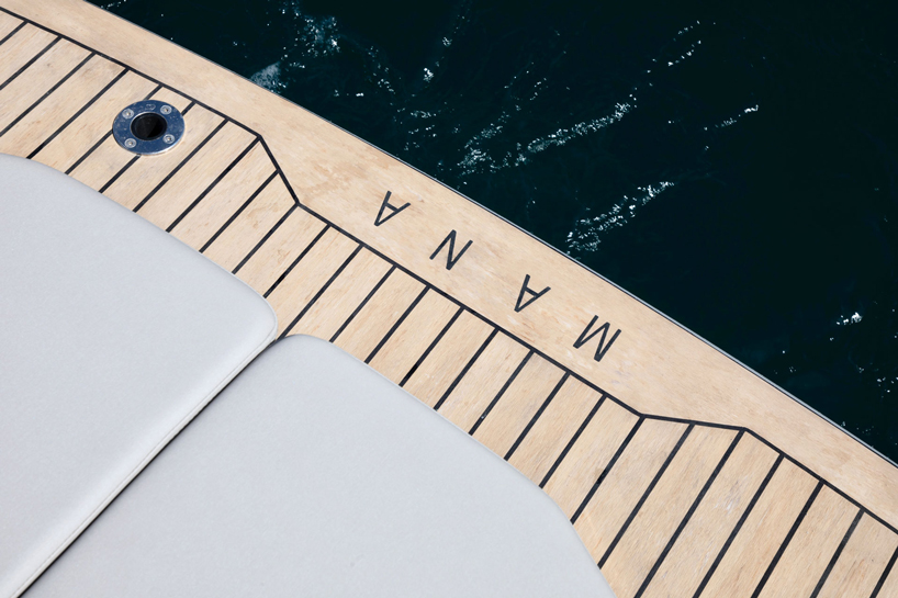 RAND designs the mana 23 electric motorboat as a 'social space on water' designboom