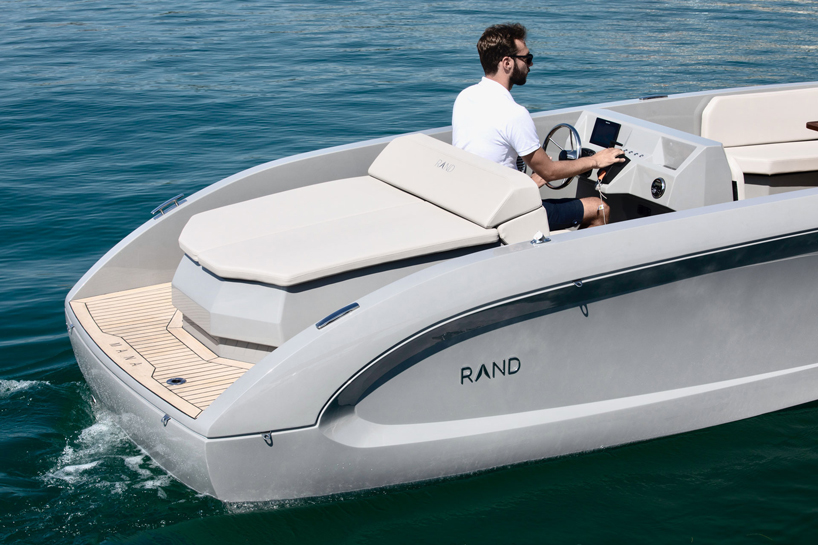 RAND designs the mana 23 electric motorboat as a 'social space on water' designboom