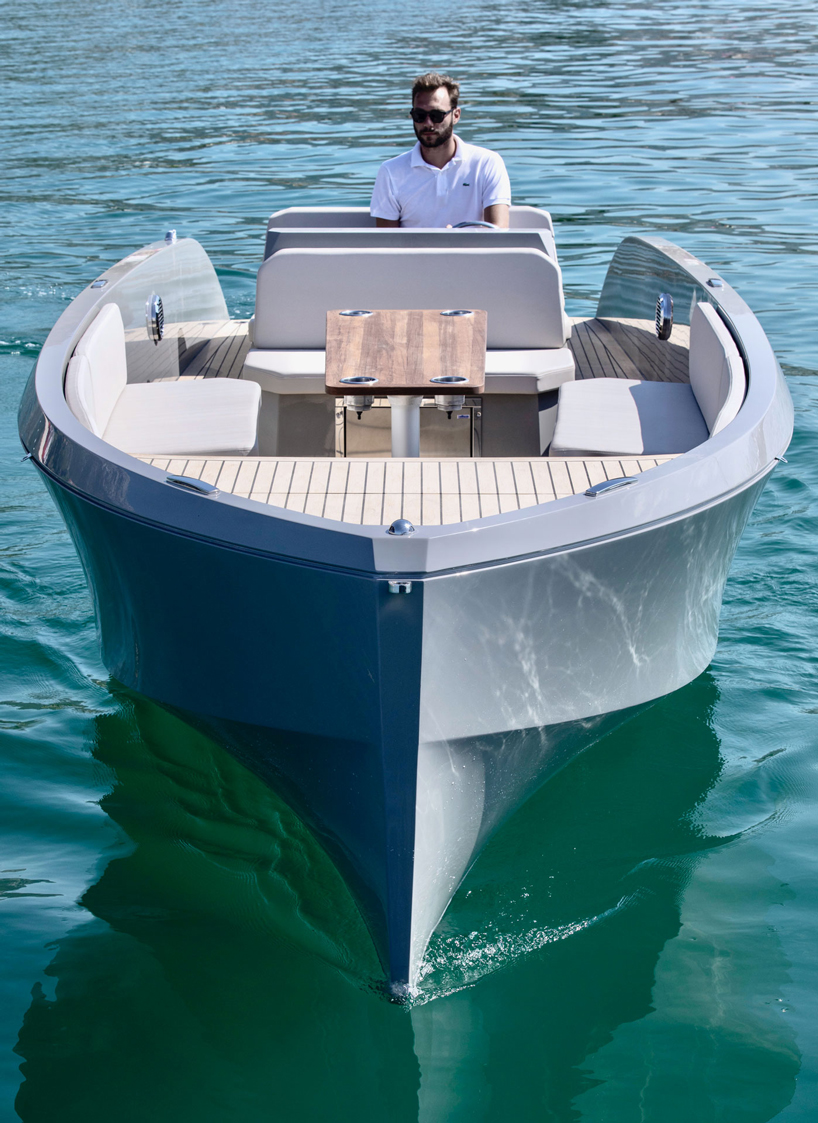 RAND designs the mana 23 electric motorboat as a 'social space on water' designboom