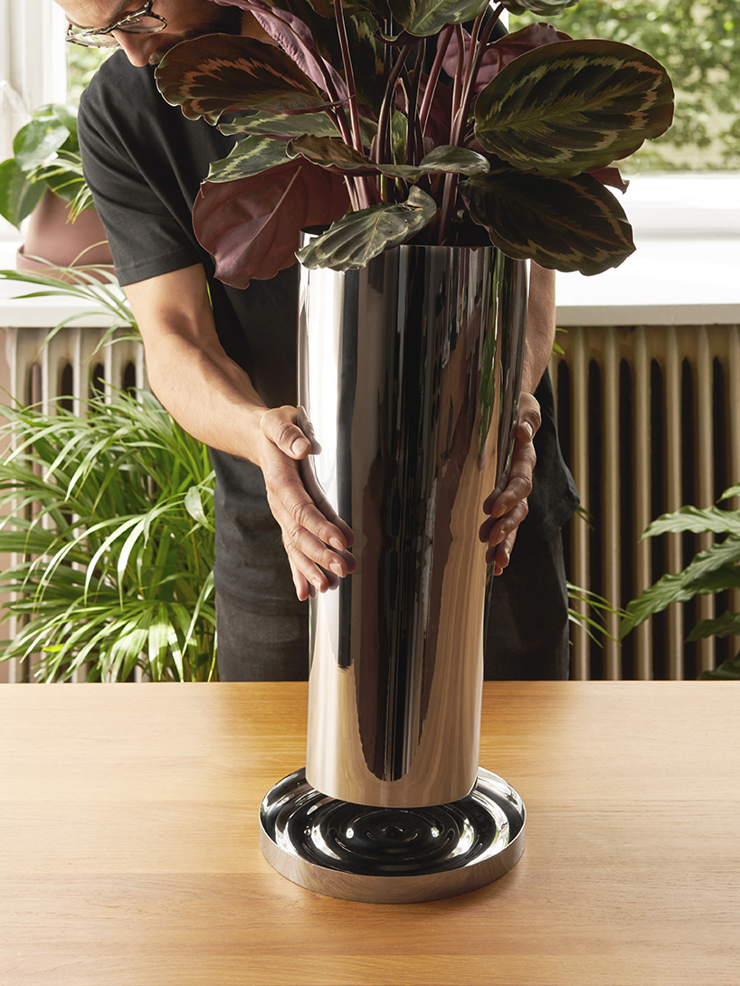 snøhetta's terra is a plant accessory series in terracota & stainless steel for georg jensen