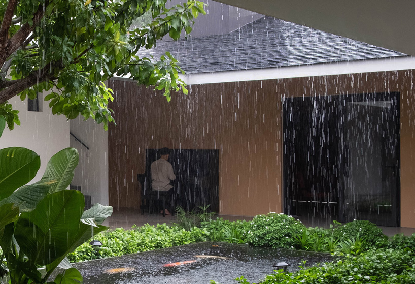 TAA design develops house in vietnam around central, tree-planted courtyard
