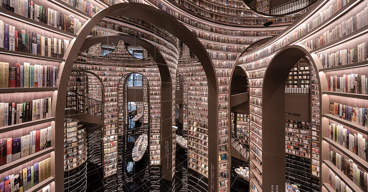 tall bookshelf arcs organize mesmerizing bookstore interior by x+living