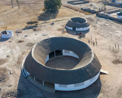 toshiko mori completes oval-shaped fass school and teachers’ residence in remote senegal