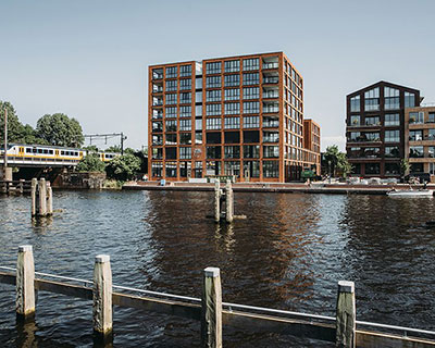 van ommeren architecten realizes 8-story warehouse residential complex in the netherlands