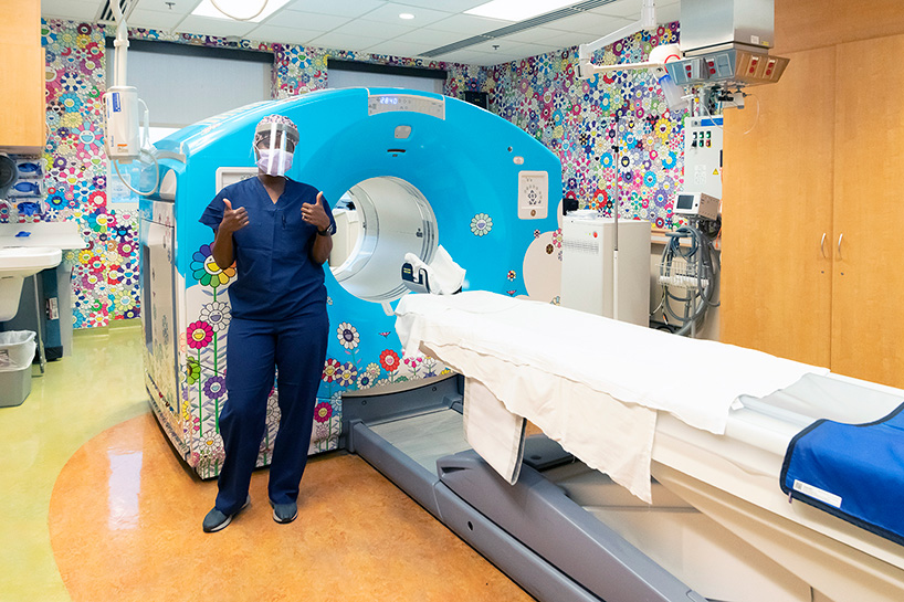 takashi murakami wraps a CT/PET scan suite at children’s hospital with signature flowers - 1