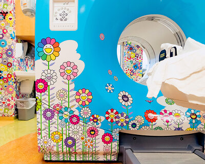 takashi murakami wraps a CT/PET scan suite at children’s hospital with signature flowers