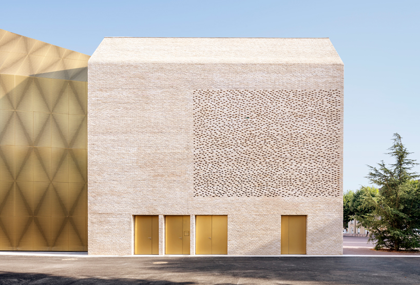 antonio virga architecte completes luminous, perforated cinema in cahors, france - 1
