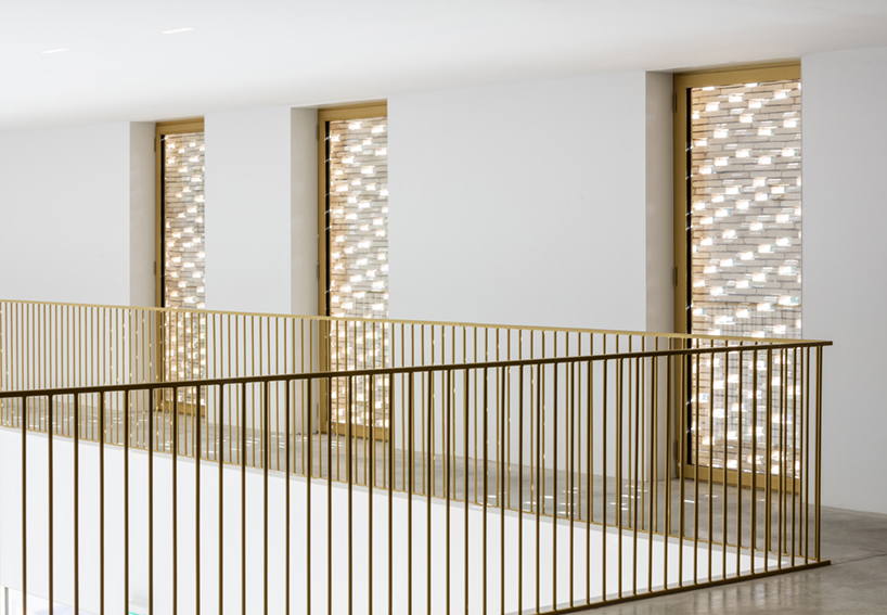antonio virga architecte completes luminous, perforated cinema in cahors, france - 13