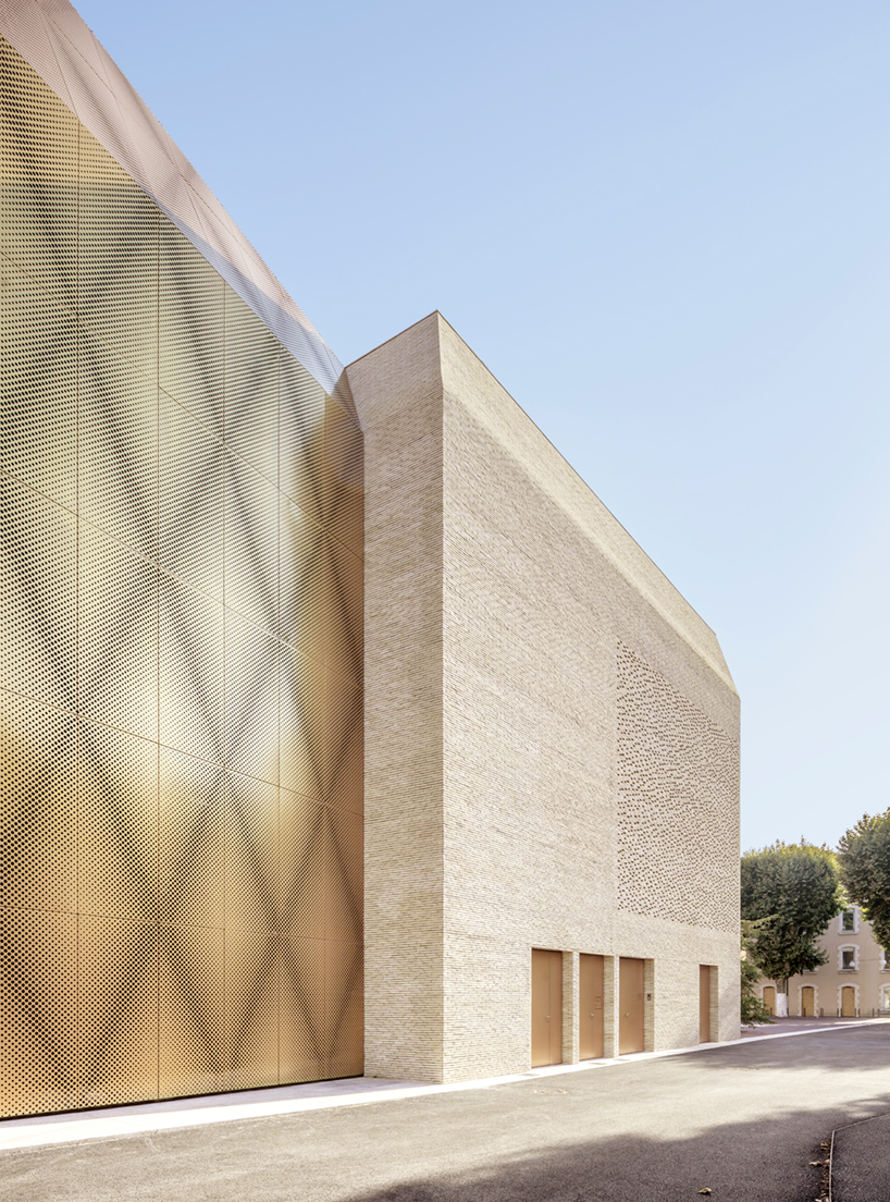 antonio virga architecte completes luminous, perforated cinema in cahors, france - 4