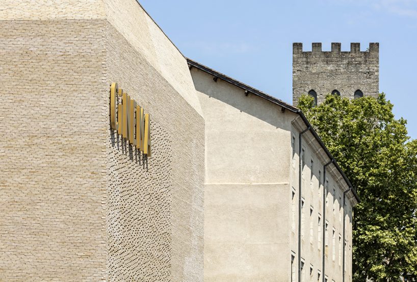 antonio virga architecte completes luminous, perforated cinema in cahors, france - 5